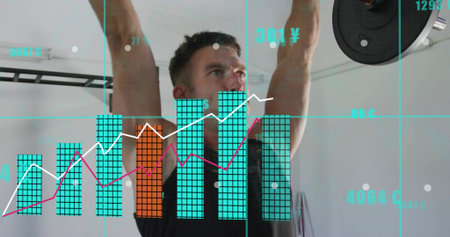 Lifting man in sleeveless black top holding barbell overhead in compact gym, with analytics overlay....