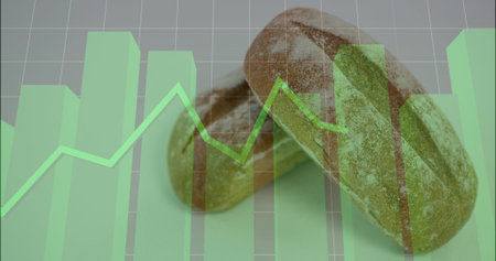 Displaying flour-dusted oval rolls resting on pale tabletop with clear green bar and line chart....