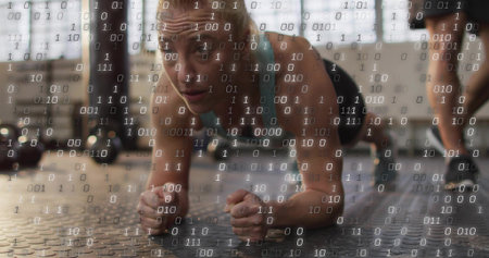 Holding forearm plank mid adult woman wearing turquoise top and dark shorts at gym, binary overlay....