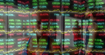 Showing stock ticker panels and yellow charts at trading floor, reflecting four in business attire....