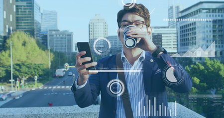 Standing Asian man in navy blazer, striped shirt holding phone, sipping coffee on overpass with HUD....