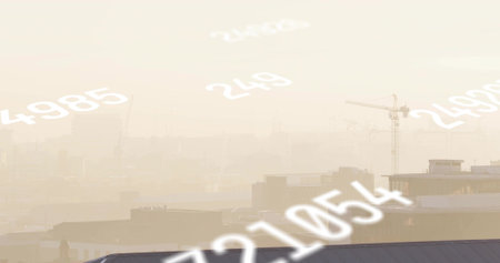Showing hazy urban skyline centered from rooftop vantage, with flat roofs, cranes, numeric overlays....