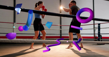Two boxers sparring in ring, woman light-blue tanktop, man dark tee, red gloves, 3D shapes floating....