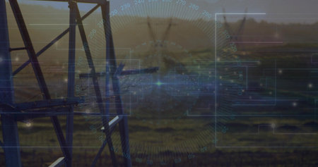 Framing steel lattice tower segment in rural field, showing HUD radar rings, insulators, copy space....