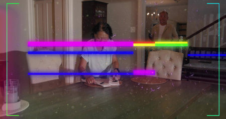 Arranging Chinese woman in light top placing napkin on placemat at table, man holding phone, glitch....