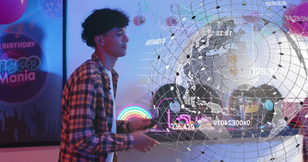 Interacting male guest wearing plaid top holding remote exploring AR globe at party, copy space....