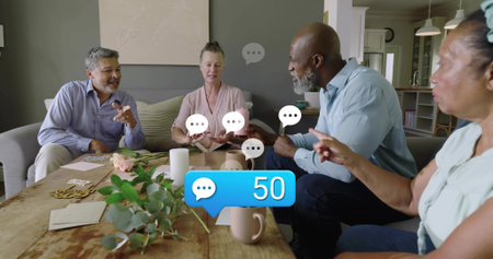 Talking four adults sitting at home around table in shirts holding cards showing chat bubble 50....