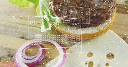 Displaying half-assembled hamburger on wooden board with patty, lettuce, onion rings, HUD overlays....