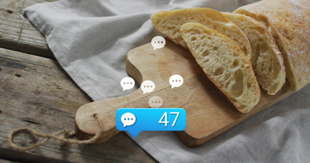 Displaying sliced ciabatta loaf on wooden board with handle and twine, speech bubbles showing 47....