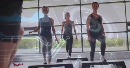 Stepping four adults in tanks following leader on black platforms in studio, showing red weights....