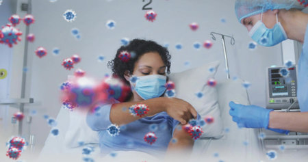 Standing nurse prepping shot at bed, patient exposing forearm masked, nurse wearing gloves....