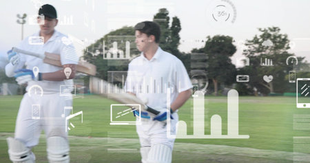 Walking two cricketers in white holding bats on pitch, wearing pads, gloves, dark cap, UI overlays....