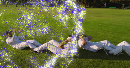 Performing sit-ups 4 athletes crunching in white uniforms on grassy field, showing particle overlay....