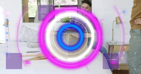 Displaying AR HUD in bedroom, men seated and standing by bed, wearing dark shirt, brown sweater....