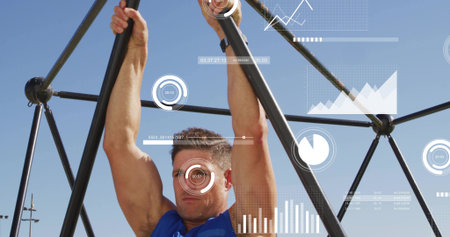 Pulling mid-adult male pulling up at outdoor gym using black frame, HUD, sleeveless blue top....