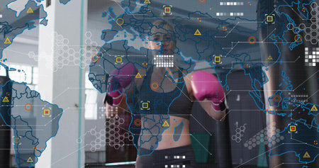 Punching female boxer training in gym near heavy bags, bright pink gloves, black athletic wear, HUD....