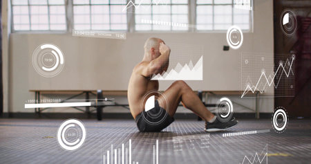 Performing shirtless man doing sit-up on gym mat in fitness studio, black shorts, HUD overlays....