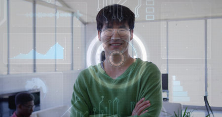 Standing 30s Korean employee crossing arms, smiling in office with round-glasses green-sweater HUD....
