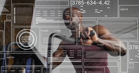 Lifting man in maroon sleeveless top gripping dumbbell right hand near gym mirror with HUD overlays....