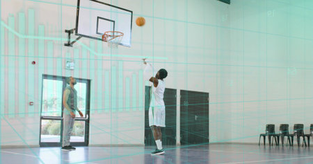 Shooting male player in white jersey sending basketball toward gym hoop, teal grid overlay. Court,...
