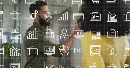Writing bearded man marking glass wall at office, olive shirt, marker, data-overlay, copy space....