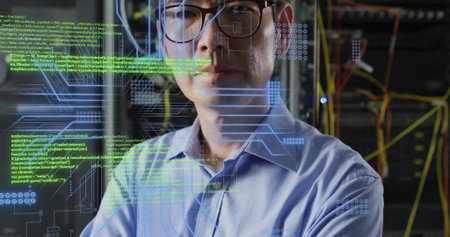 Standing Korean man with glasses and collared shirt checking server racks in data center, HUD....