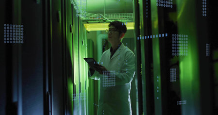 Inspecting Korean tech wearing white lab coat, holding tablet, checking server LEDs in data center....