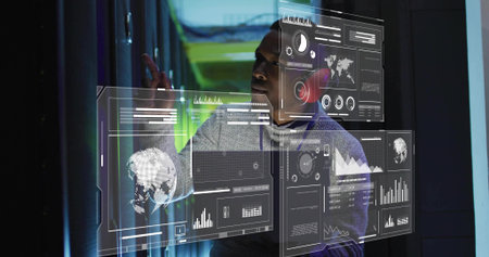Interacting man in light gray hoodie using holographic panels in server aisle with LED lighting....
