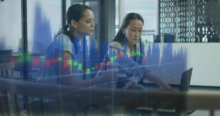 Pointing pair studying laptop at office, wearing workwear, holding coffee cup, chart overlay....