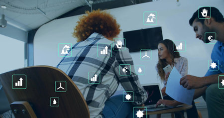 Leaning curlyhaired coworker in plaid shirt leading talk at meeting room with laptop and data icons....