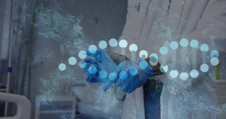 Adjusting clinician pulling on blue gloves in hospital, wearing white lab coat, DNA overlay....