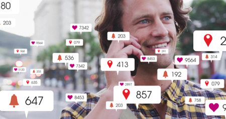 Man wearing yellow-plaid shirt smiling holding phone to ear on street, bag strap, icons, copy space....