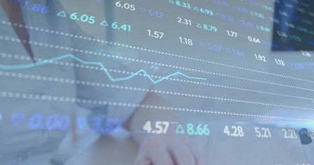 Displaying mature woman studying financial overlay in light blouse at desk, tickers 4.57 8.66. Data,...