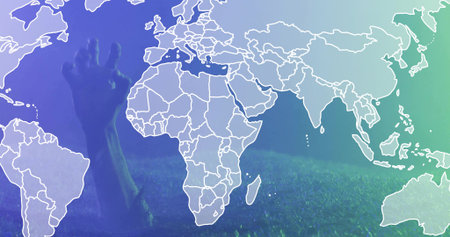 Reaching bare male forearm and hand rising from grass in field, with world map overlay. Surreal, conceptual, gradient, contour, limb, meadow, minimalの写真素材