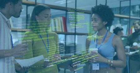 Discussing team in business casual wearing badges pointing at tablet holding documents code overlay....