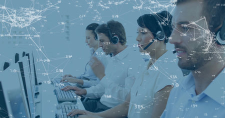 Typing, agents at call center in light shirts using monitors keyboards headsets with data overlay....