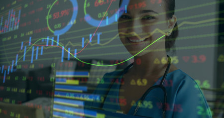 Standing nurse in teal scrubs with stethoscope and folder in clinic, with stock charts, copy space....