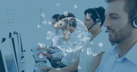 Typing, four agents in collared shirts, blouses at office desks, with headsets, keys, globe overlay....