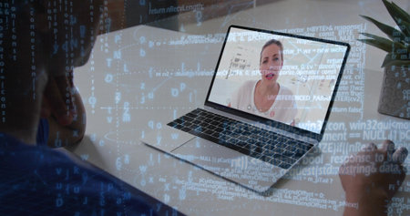 Watching woman holding mug viewing laptop at desk, with onscreen speaker in white top, code overlay....