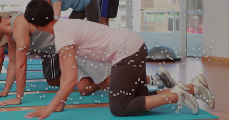 Mid adult female kneeling on blue mat following coach cue, animated overlay showing core mobility....
