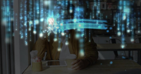 Sitting adult male in brown jacket using tablet at cafe, with holographic binary overlay. Data,...