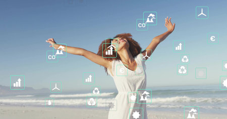 Standing woman wearing white sleeveless dress raising arms at beach, with environmental icons....