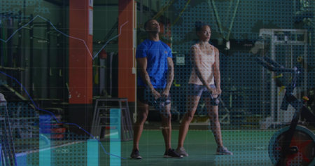 Holding kettlebells, two adults performing swings on gym turf, wearing sport tops with data overlay....