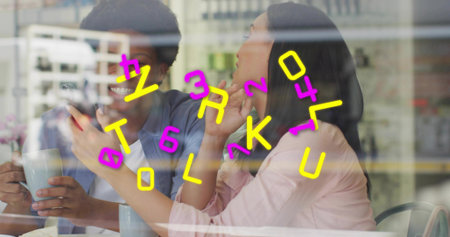 Smiling couple in blue shirt, pink blouse, holding mugs and phone by cafe window with stickers. Coffee, cup, smartphone, reflection, glass, candid, conversationの写真素材