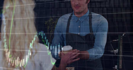 Handing barista in blue shirt and striped apron passing takeaway cup at cafe, trading chart overlay....
