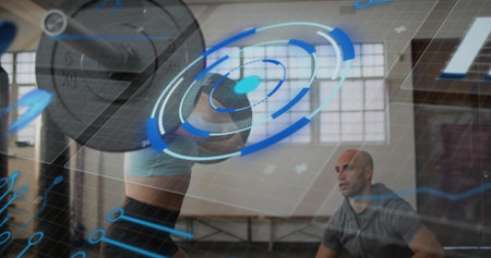 Lifting woman pressing loaded barbell overhead in gym in sports bra and shorts, HUD overlaying....