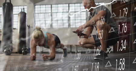 Holding forearm plank woman in gymwear exercising at gym trainer timing phone with metrics overlay....