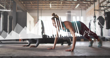 Doing push-ups partners wearing teal top, maroon leggings on padded gym floor, with data overlay....
