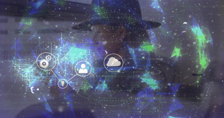Standing Asian woman wearing wide-brim hat and dark outerwear facing studio, with network graphics....