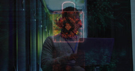 Holding laptop man wearing sweater, lanyard headset checking racks in server room with padlock icon....
